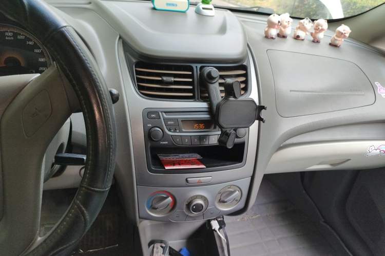 Used Chevrolet Sail 2013 Sedan 1.2L Manual Fashionable Happiness Edition Audio And AC Panel