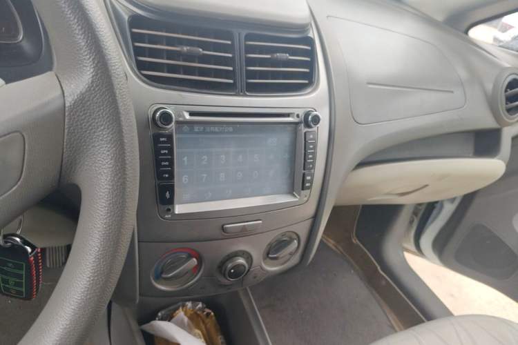 Used Chevrolet Sail 2013 Sedan 1.4L Manual Happiness Edition II Audio And AC Panel