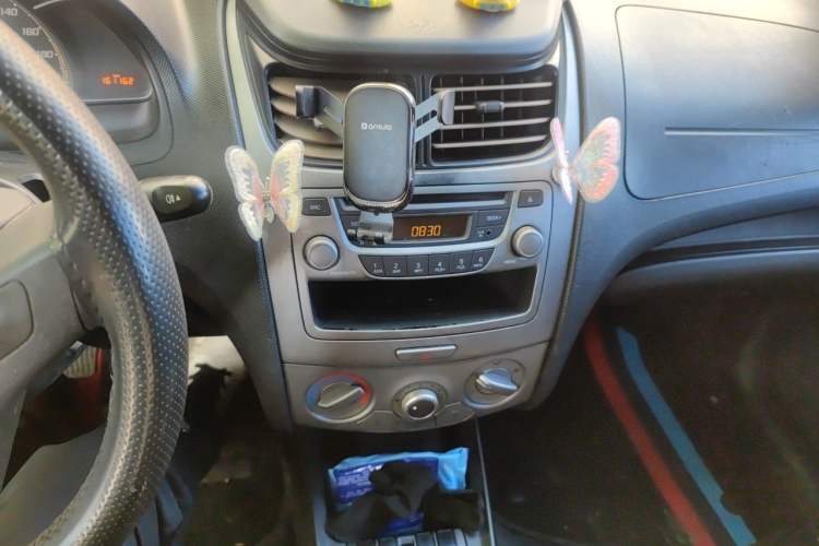Used Chevrolet Sail 2013 Sedan 1.4L Manual Ideal Happiness Edition Audio And AC Panel