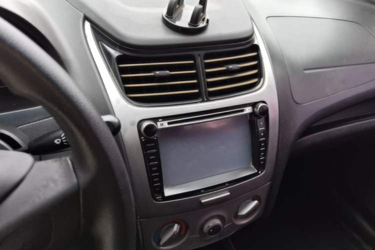 Used Chevrolet Sail 2013 Sedan 1.4L Manual Ideal Happiness Edition Audio And AC Panel