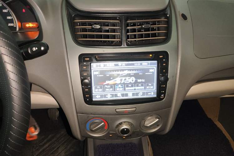 Used Chevrolet Sail 2013 Sedan 1.4L Manual Elegance Edition Audio And AC Panel