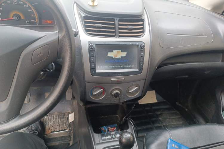 Used Chevrolet Sail 2013 Sedan 1.2L Manual Warm Edition Audio And AC Panel