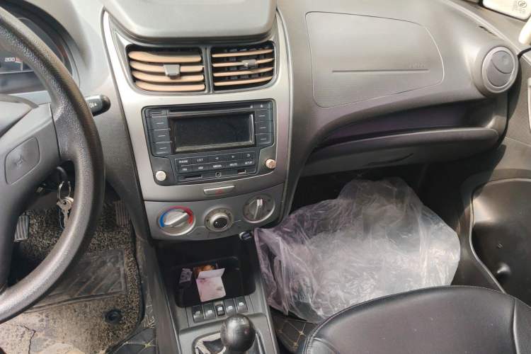 Used Chevrolet Sail 2013 Sedan 1.2L Manual Ideal Edition Audio And AC Panel