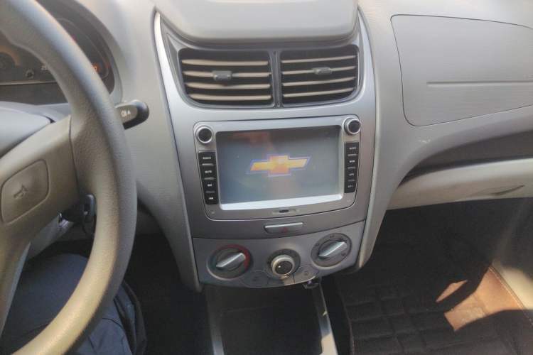 Used Chevrolet Sail 2013 Sedan 1.2L Manual Warm Edition Audio And AC Panel