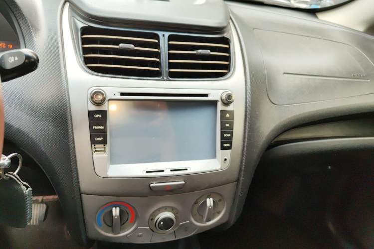 Used Chevrolet Sail 2013 Sedan 1.4L Manual Ideal Happiness Edition Audio And AC Panel