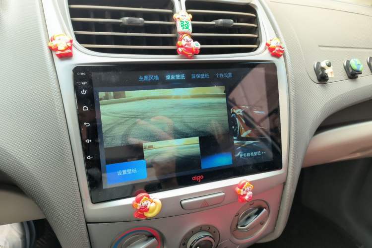 Used Chevrolet Sail 2013 Sedan 1.2L AMT Ideal Edition Audio And AC Panel