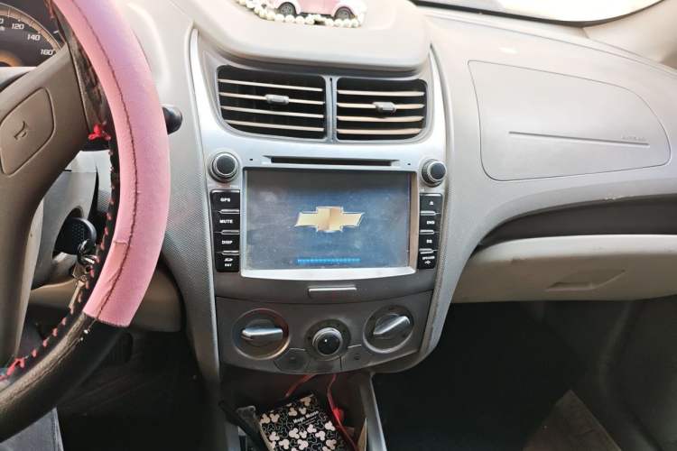 Used Chevrolet Sail 2013 Sedan 1.4L Manual Elegance Edition Audio And AC Panel