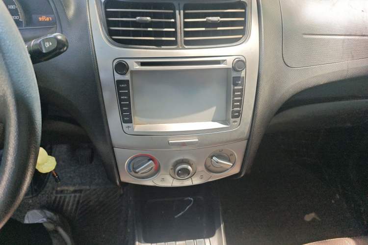 Used Chevrolet Sail 2013 Sedan 1.4L Manual Ideal Happiness Edition Audio And AC Panel
