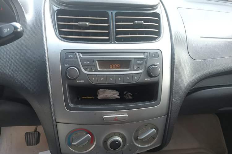 Used Chevrolet Sail 2013 Sedan 1.4L Manual Ideal Happiness Edition Audio And AC Panel