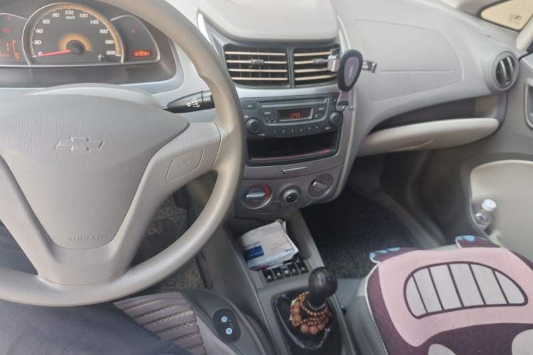 Used Chevrolet Sail 2013 Sedan 1.4L Manual Ideal Happiness Edition Audio And AC Panel