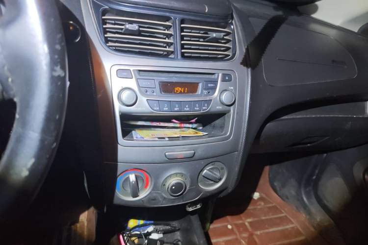 Used Chevrolet Sail 2013 Sedan 1.4L Manual Ideal Happiness Edition Audio And AC Panel