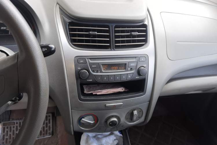 Used Chevrolet Sail 2013 Sedan 1.2L Manual Warm Edition Audio And AC Panel