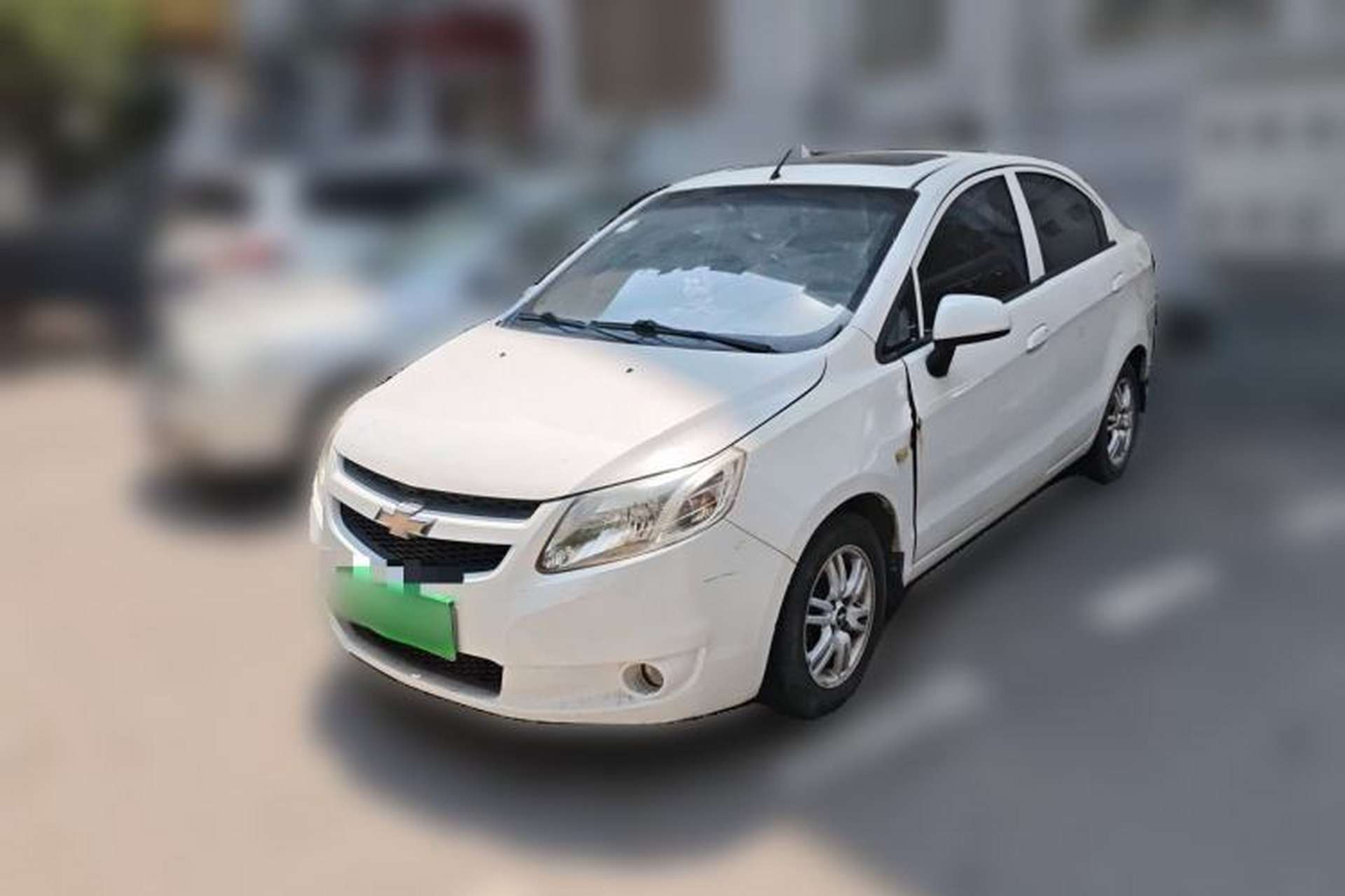 Used Chevrolet Sail 2013 Sedan 1.4L Manual Elegance Edition Front Left 45 Deg