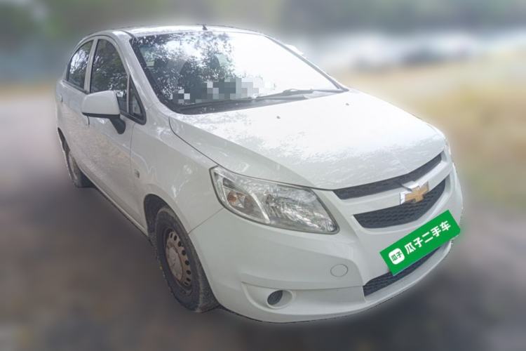 Used Chevrolet Sail 2013 Sedan 1.2L Manual Fashionable Happiness Edition Front Right 45 Deg