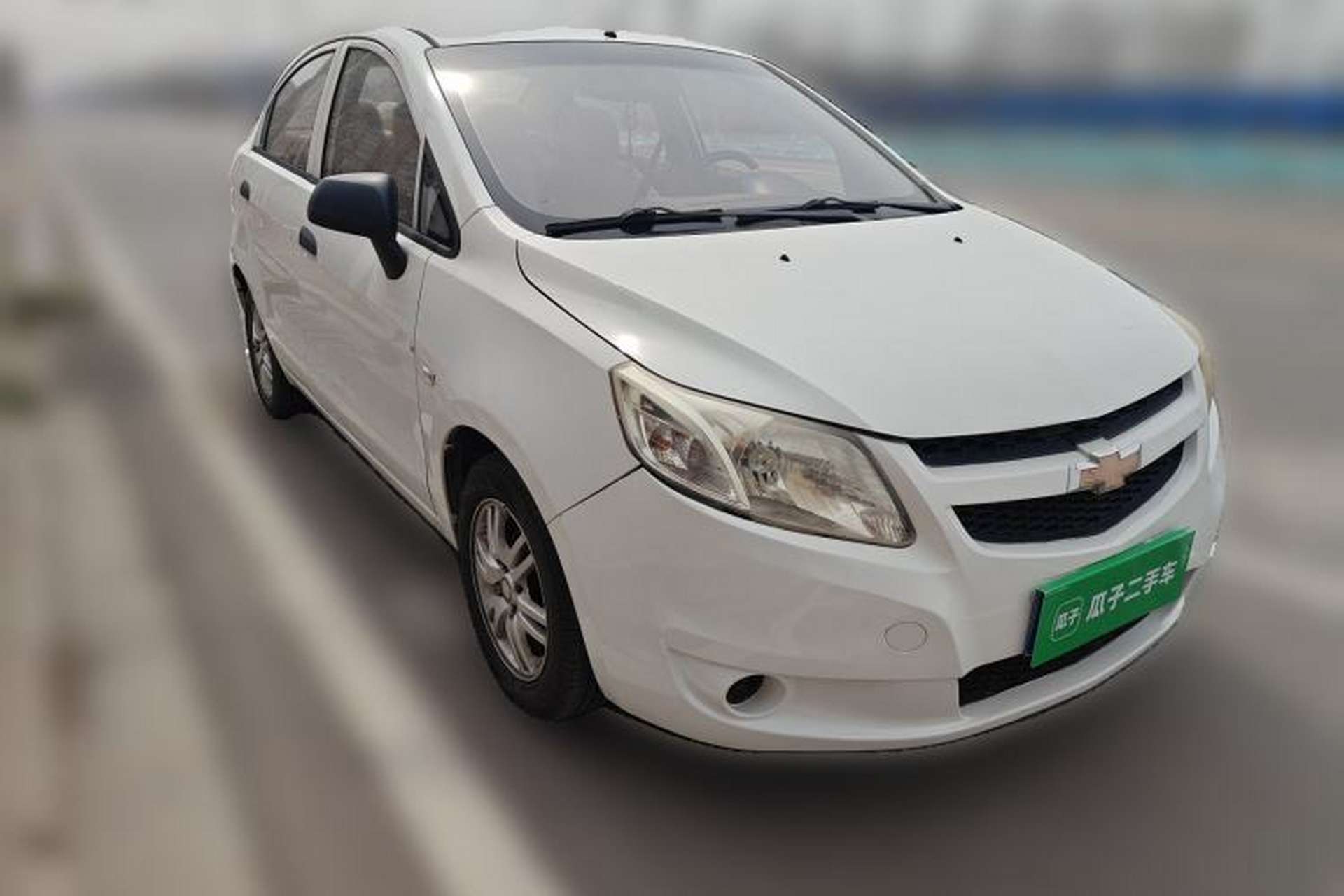 Used Chevrolet Sail 2013 Sedan 1.2L AMT Ideal Edition Front Right 45 Deg