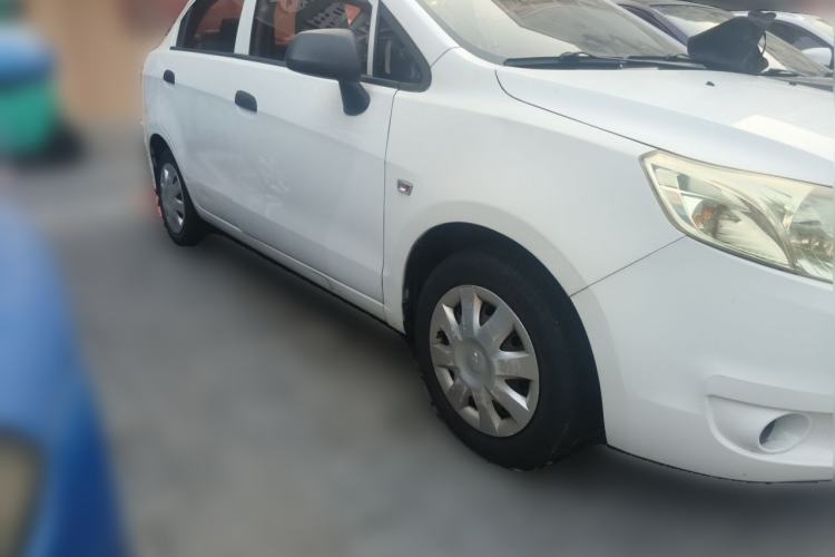 Used Chevrolet Sail 2013 Sedan 1.4L Manual Ideal Happiness Edition Front Right 45 Deg