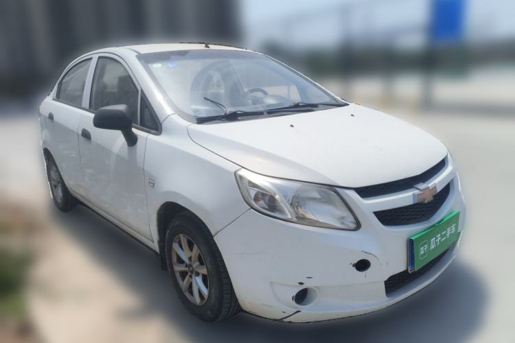 Used Chevrolet Sail 2013 Sedan 1.2L Manual Fashionable Happiness Edition Front Right 45 Deg