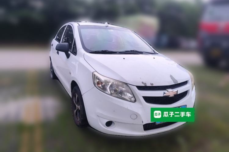 Used Chevrolet Sail 2013 Sedan 1.2L Manual Fashionable Happiness Edition Front Right 45 Deg