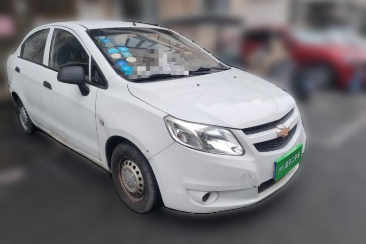 Used Chevrolet Sail 2013 Sedan 1.2L Manual Fashionable Happiness Edition Front Right 45 Deg