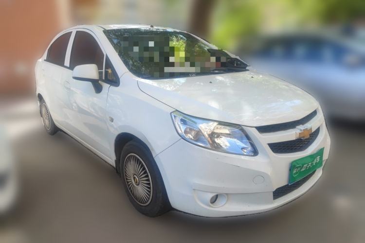 Used Chevrolet Sail 2013 Sedan 1.4L Manual Ideal Happiness Edition Front Right 45 Deg