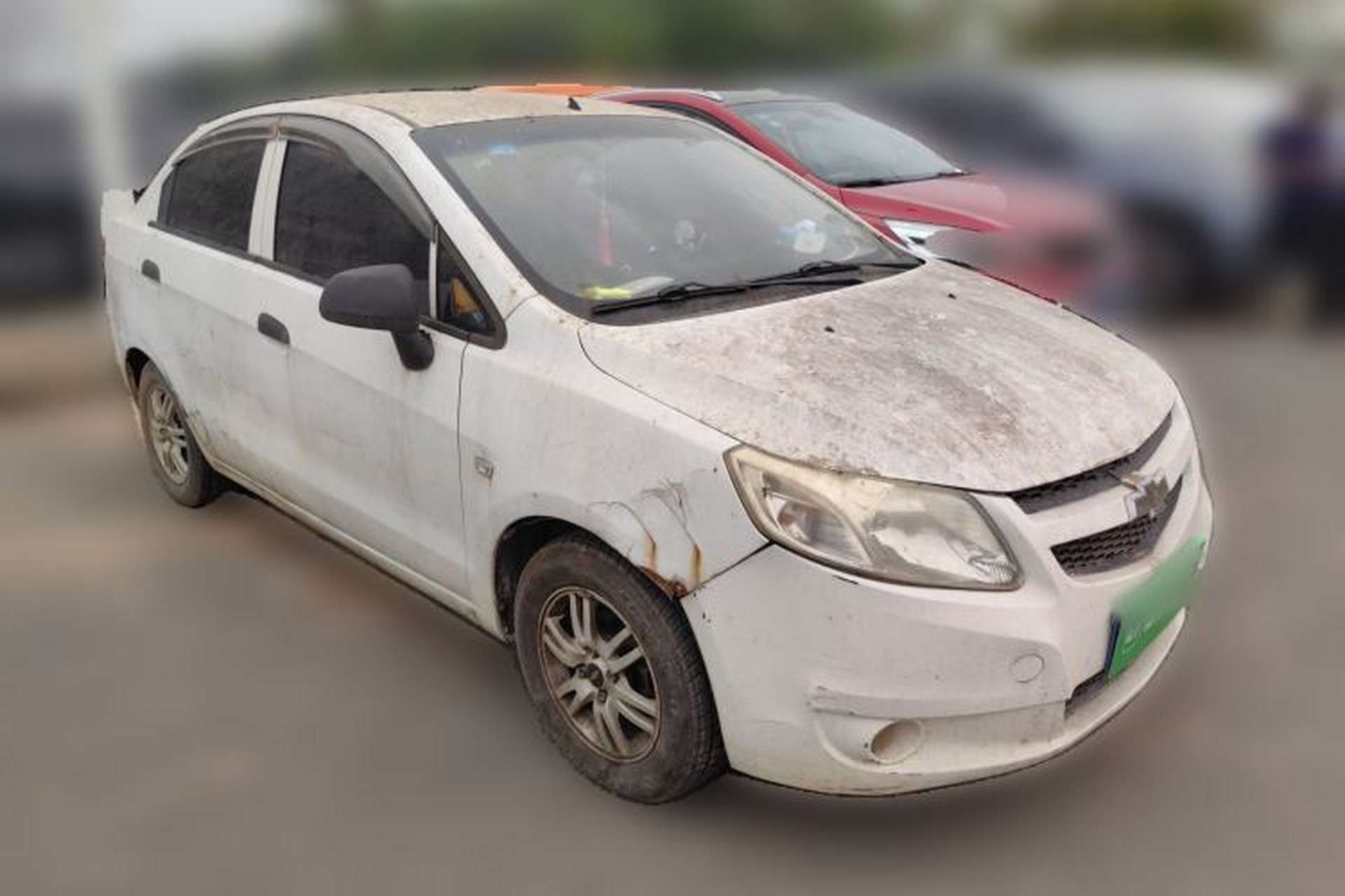 Used Chevrolet Sail 2013 Sedan 1.2L Manual Fashionable Happiness Edition Front Right 45 Deg