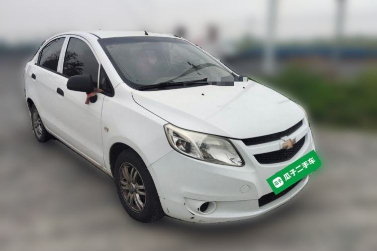Used Chevrolet Sail 2013 Sedan 1.4L Manual Ideal Happiness Edition Front Right 45 Deg