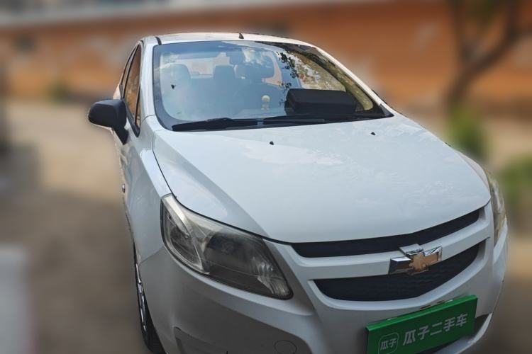 Used Chevrolet Sail 2013 Sedan 1.2L Manual Fashionable Happiness Edition Front Right 45 Deg