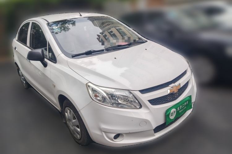 Used Chevrolet Sail 2013 Sedan 1.4L Manual Ideal Happiness Edition Front Right 45 Deg