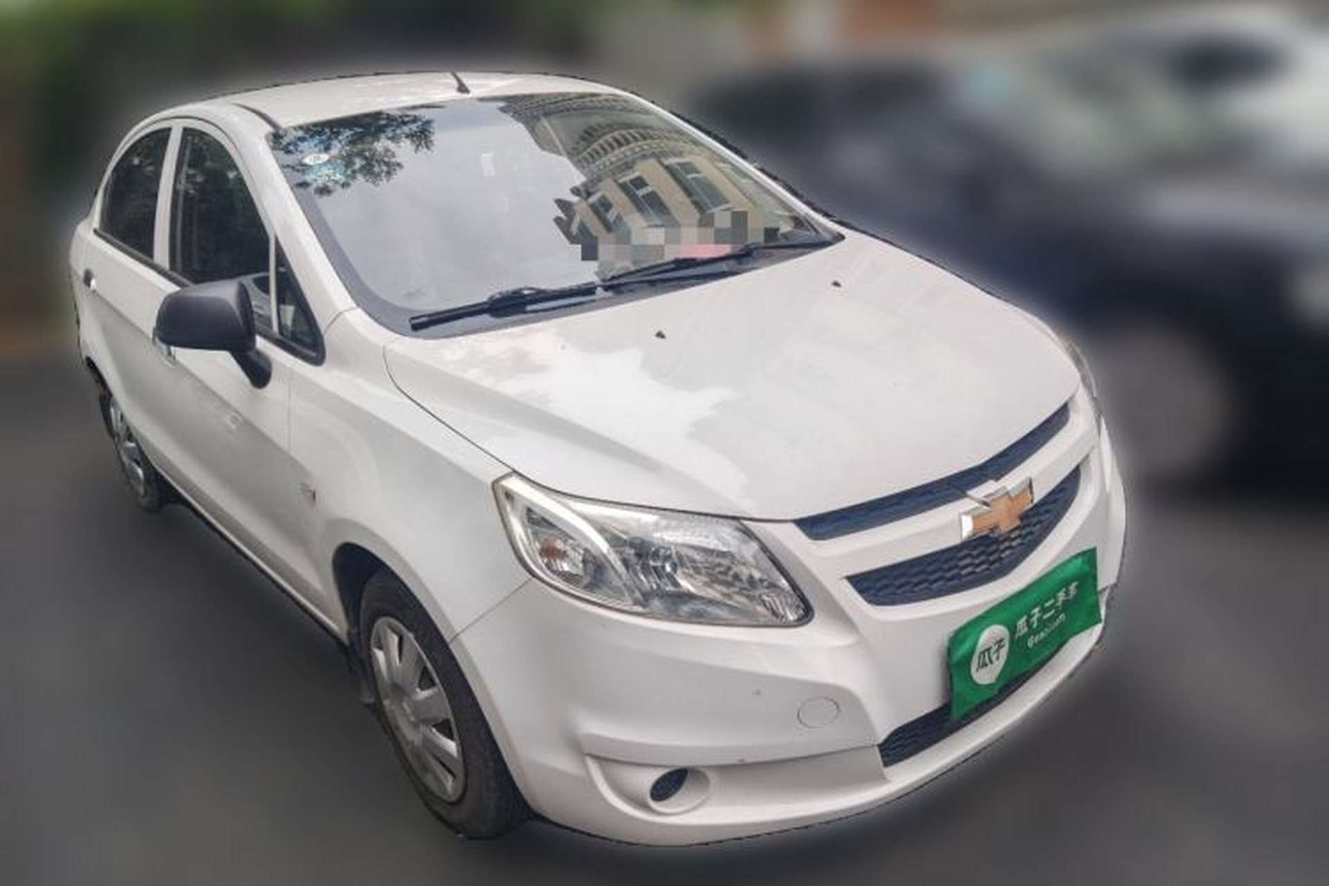 Used Chevrolet Sail 2013 Sedan 1.4L Manual Ideal Happiness Edition Front Right 45 Deg