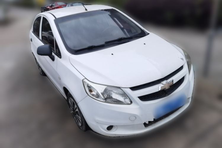 Used Chevrolet Sail 2013 Sedan 1.4L Manual Ideal Happiness Edition Front Right 45 Deg
