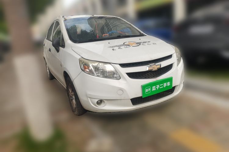 Used Chevrolet Sail 2013 Sedan 1.2L Manual Fashionable Happiness Edition Front Right 45 Deg