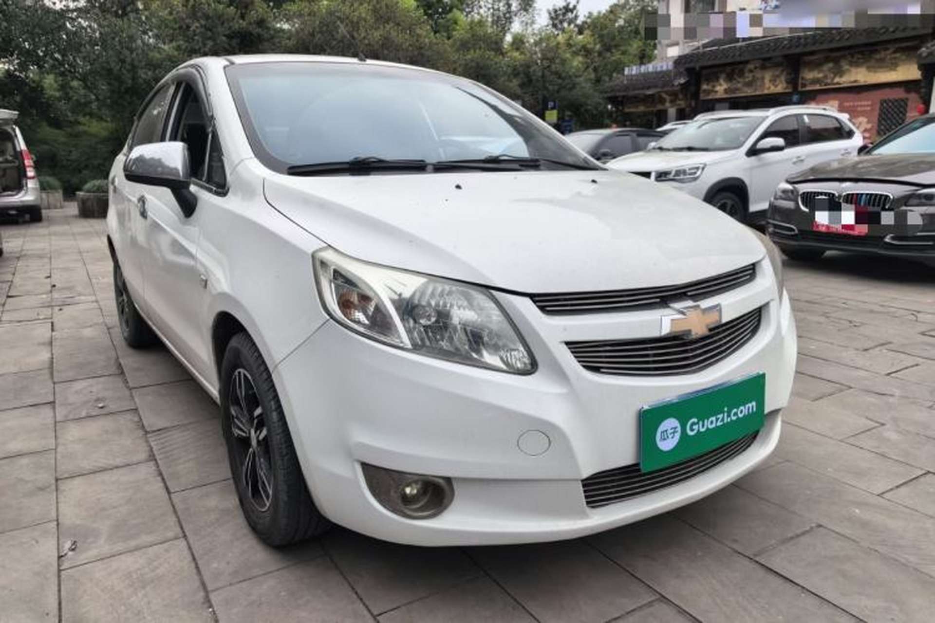 Used Chevrolet Sail 2013 Sedan 1.2L Manual Fashionable Happiness Edition Front Right 45 Deg