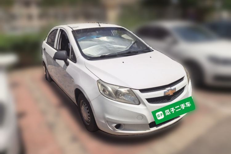 Used Chevrolet Sail 2013 Sedan 1.2L Manual Fashionable Happiness Edition Front Right 45 Deg