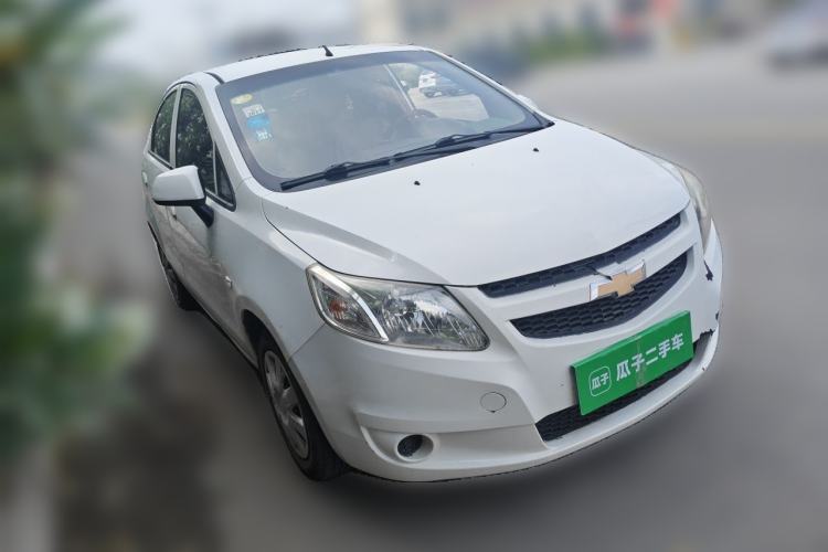 Used Chevrolet Sail 2013 Sedan 1.4L Manual Ideal Happiness Edition Front Right 45 Deg