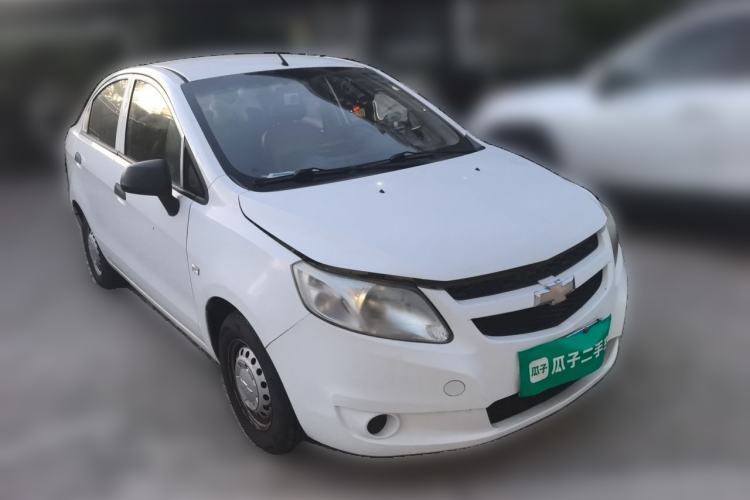 Used Chevrolet Sail 2013 Sedan 1.2L Manual Fashionable Happiness Edition Front Right 45 Deg