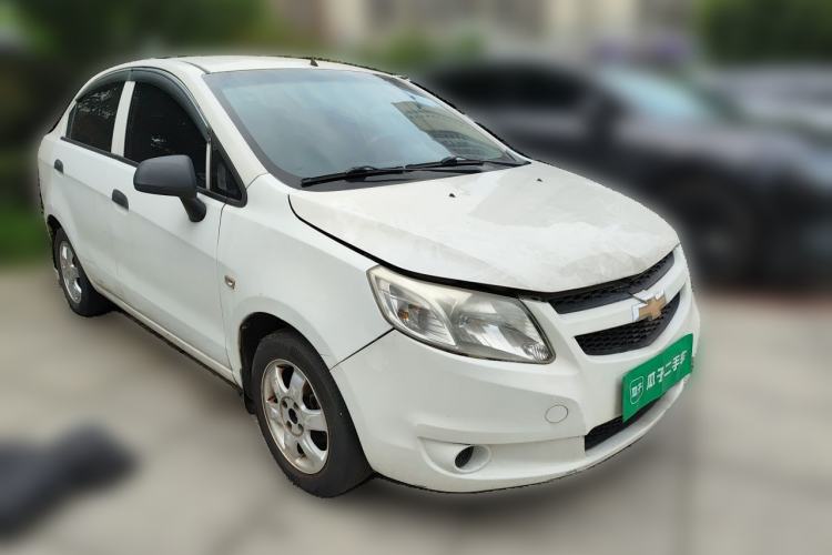 Used Chevrolet Sail 2013 Sedan 1.4L Manual Ideal Happiness Edition Front Right 45 Deg