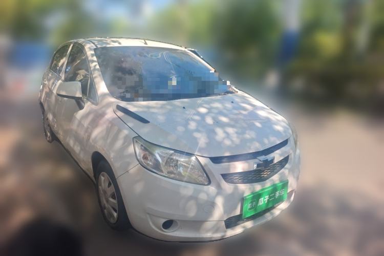 Used Chevrolet Sail 2013 Sedan 1.4L Manual Ideal Happiness Edition Front Right 45 Deg
