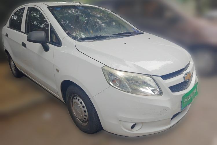 Used Chevrolet Sail 2013 Sedan 1.2L Manual Fashionable Happiness Edition Front Right 45 Deg