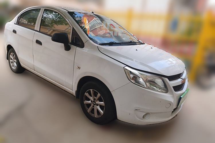 Used Chevrolet Sail 2013 Sedan 1.2L Manual Fashionable Happiness Edition Front Right 45 Deg