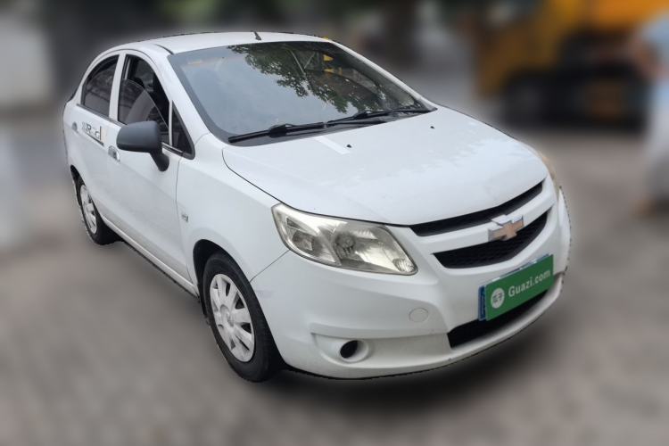 Used Chevrolet Sail 2013 Sedan 1.4L Manual Ideal Happiness Edition Front Right 45 Deg