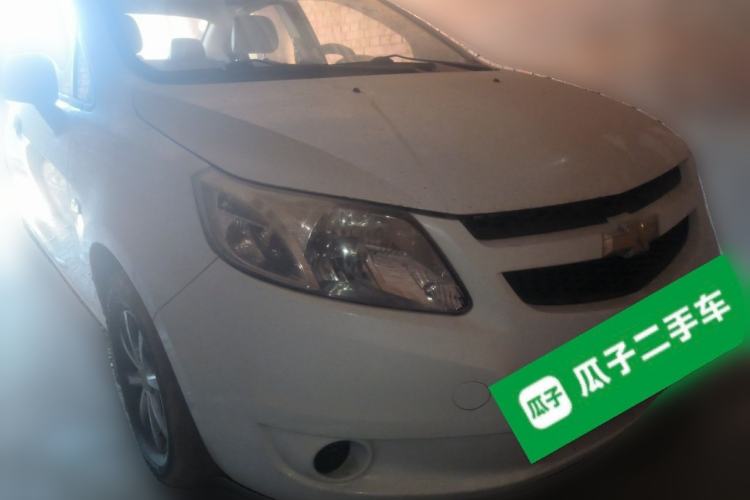 Used Chevrolet Sail 2013 Sedan 1.2L Manual Fashionable Happiness Edition Front Right 45 Deg