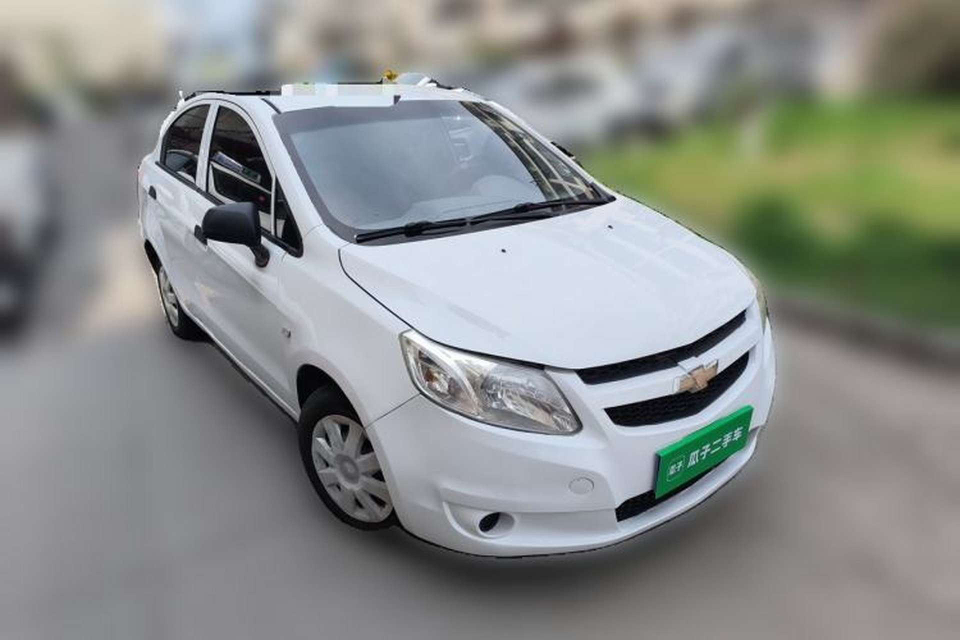 Used Chevrolet Sail 2013 Sedan 1.2L AMT Ideal Edition Front Right 45 Deg