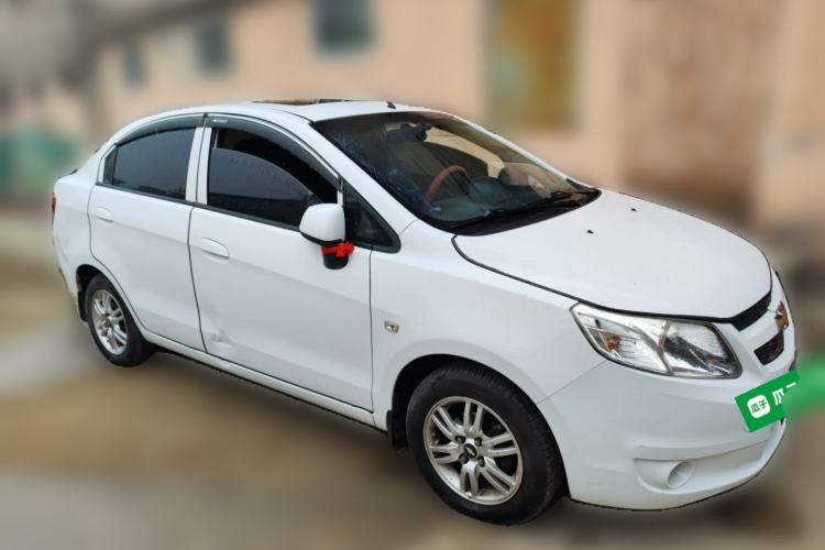 Used Chevrolet Sail 2013 Sedan 1.4L Manual Happiness Edition II Front Right 45 Deg
