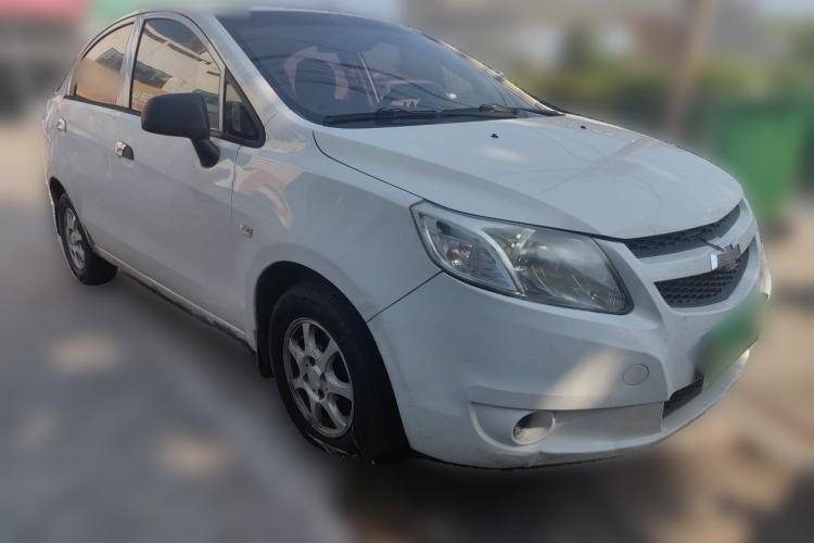 Used Chevrolet Sail 2013 Sedan 1.2L Manual Fashionable Happiness Edition Front Right 45 Deg