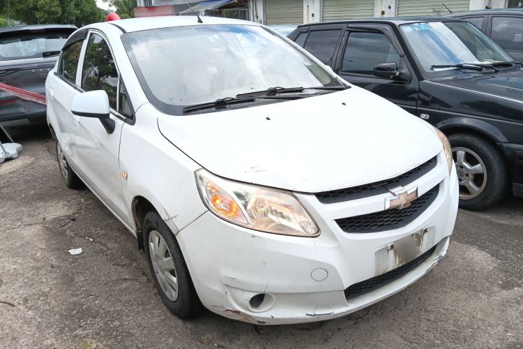 Used Chevrolet Sail 2013 Sedan 1.2L Manual Warm Edition Front Right 45 Deg