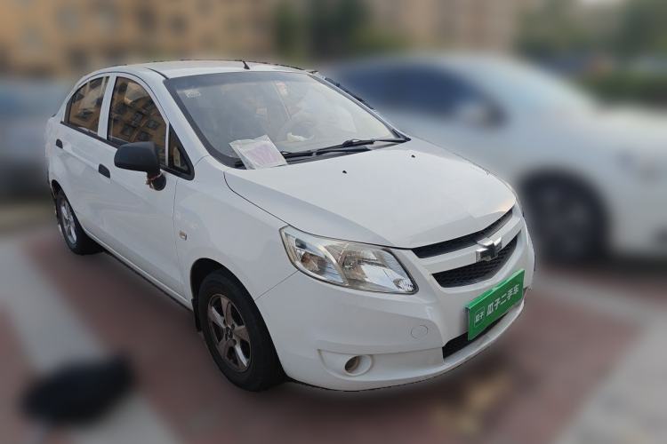 Used Chevrolet Sail 2013 Sedan 1.2L Manual Fashionable Happiness Edition Front Right 45 Deg