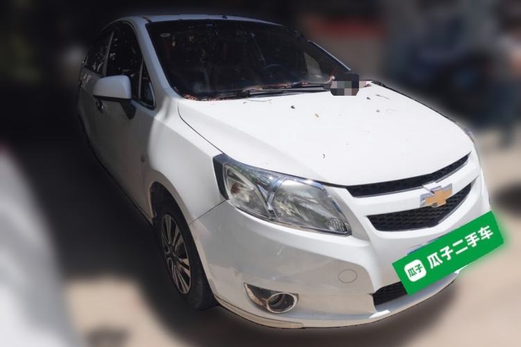 Used Chevrolet Sail 2013 Sedan 1.4L Manual Happiness Edition II Front Right 45 Deg