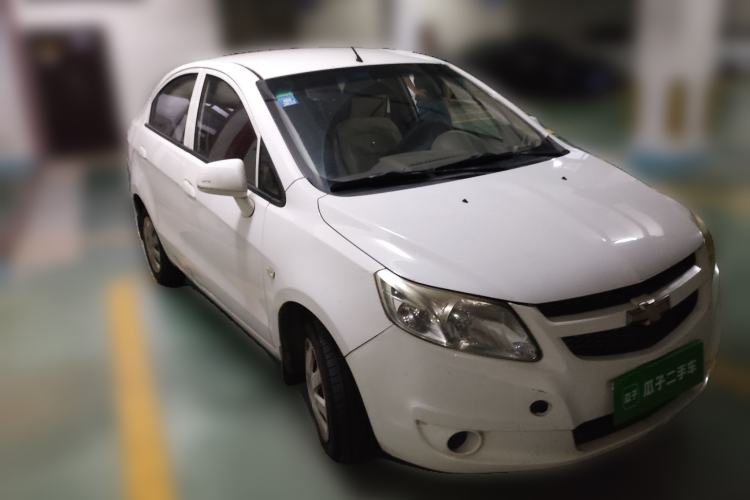 Used Chevrolet Sail 2013 Sedan 1.4L Manual Ideal Happiness Edition Front Right 45 Deg