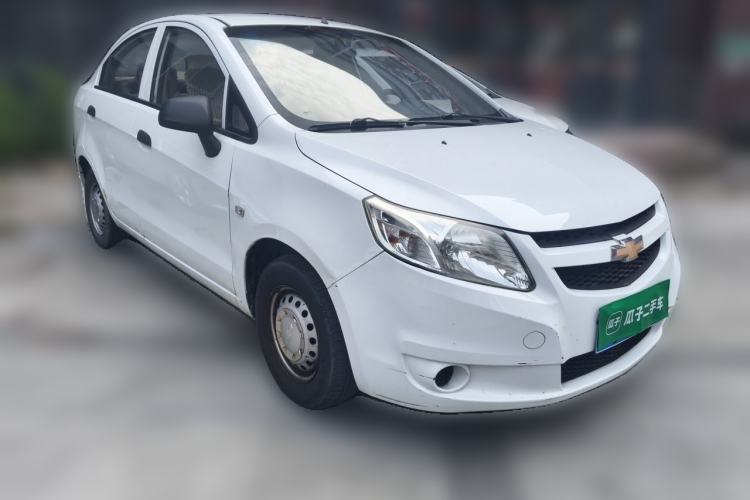 Used Chevrolet Sail 2013 Sedan 1.2L Manual Fashionable Happiness Edition Front Right 45 Deg