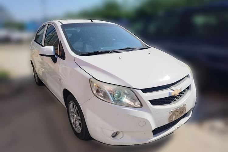 Used Chevrolet Sail 2013 Sedan 1.4L Manual Happiness Edition II Front Right 45 Deg